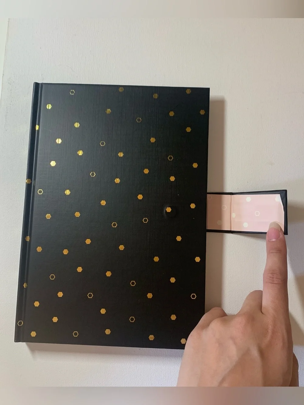 Brand new Punch Studio Black notebook with gold polka dots and gold bee charm
